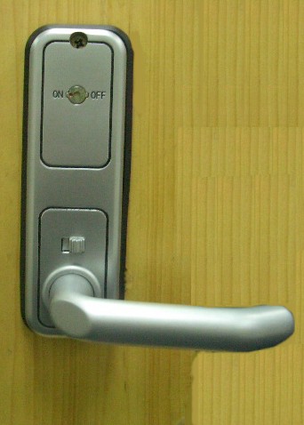 Turn the button to change code, no need to dismount the lock from the door to change code